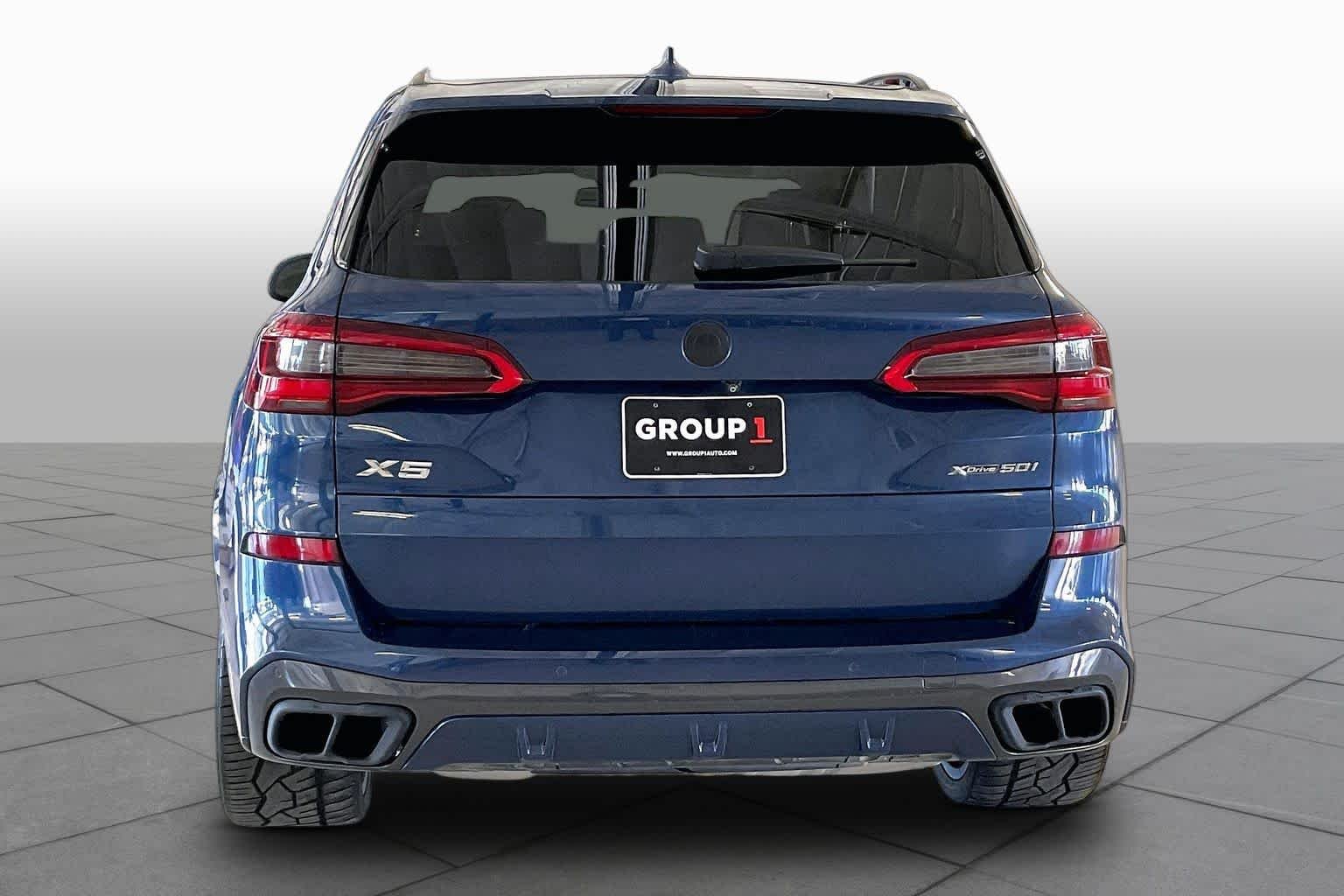 Used 2019 Phytonic Blue Metallic BMW xDrive50i image 4
