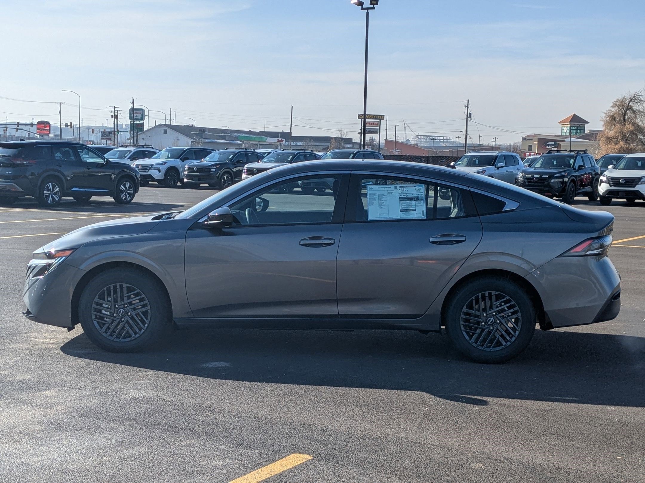New 2026 Gun Metallic Nissan SV image 7