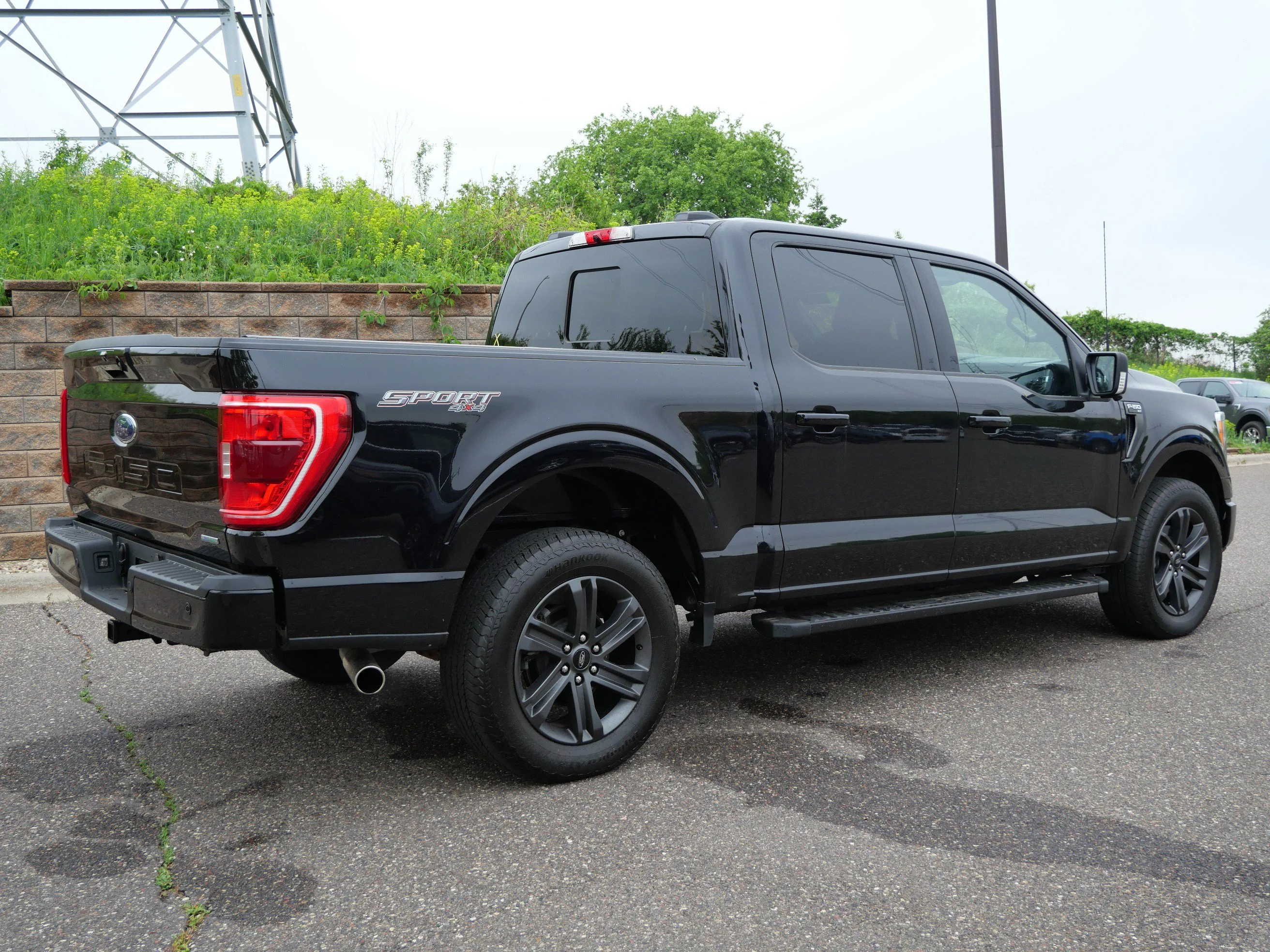 Certified Used 2023 Agate Black Metallic Ford XLT 4WD SuperCrew 5.5 Box image 6
