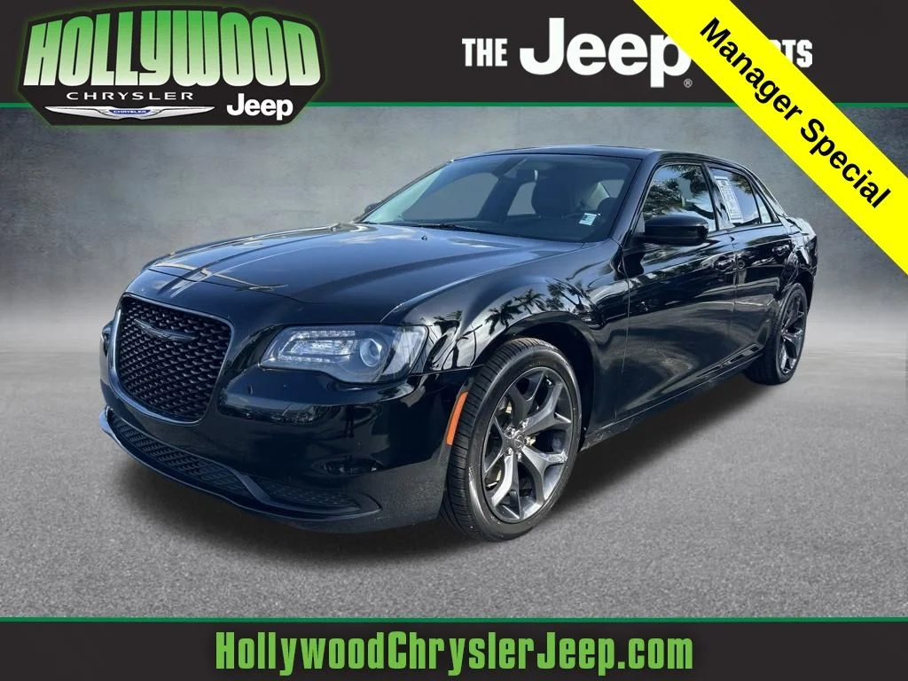 Used 2021 Black Chrysler Touring image 1