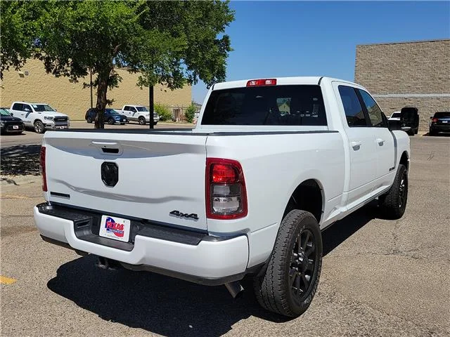 Used 2024 Bright White Clearcoat RAM Big Horn 4x4 Crew Cab 6.3 ft. box 149 in. WB image 4