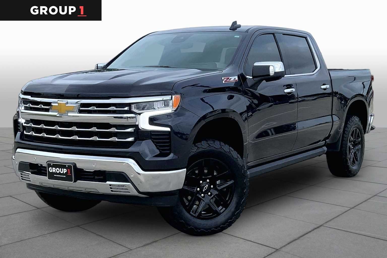 Used 2024 Dark Ash Metallic Chevrolet LTZ image 1