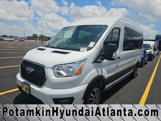 2022 Ford Transit 350 XLT Med Roof Sliding Pass. 148's photo
