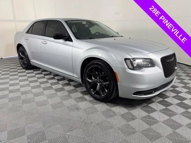 Used 2023 Silver Chrysler Touring image 1