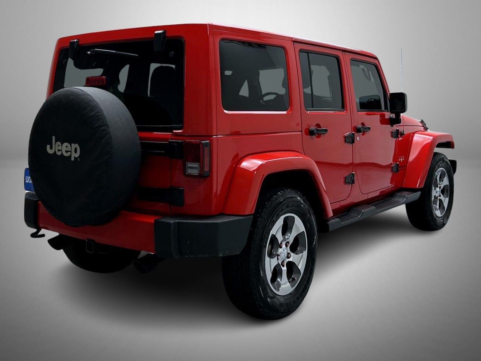 Used 2016 Red Jeep Unlimited Sahara image 5
