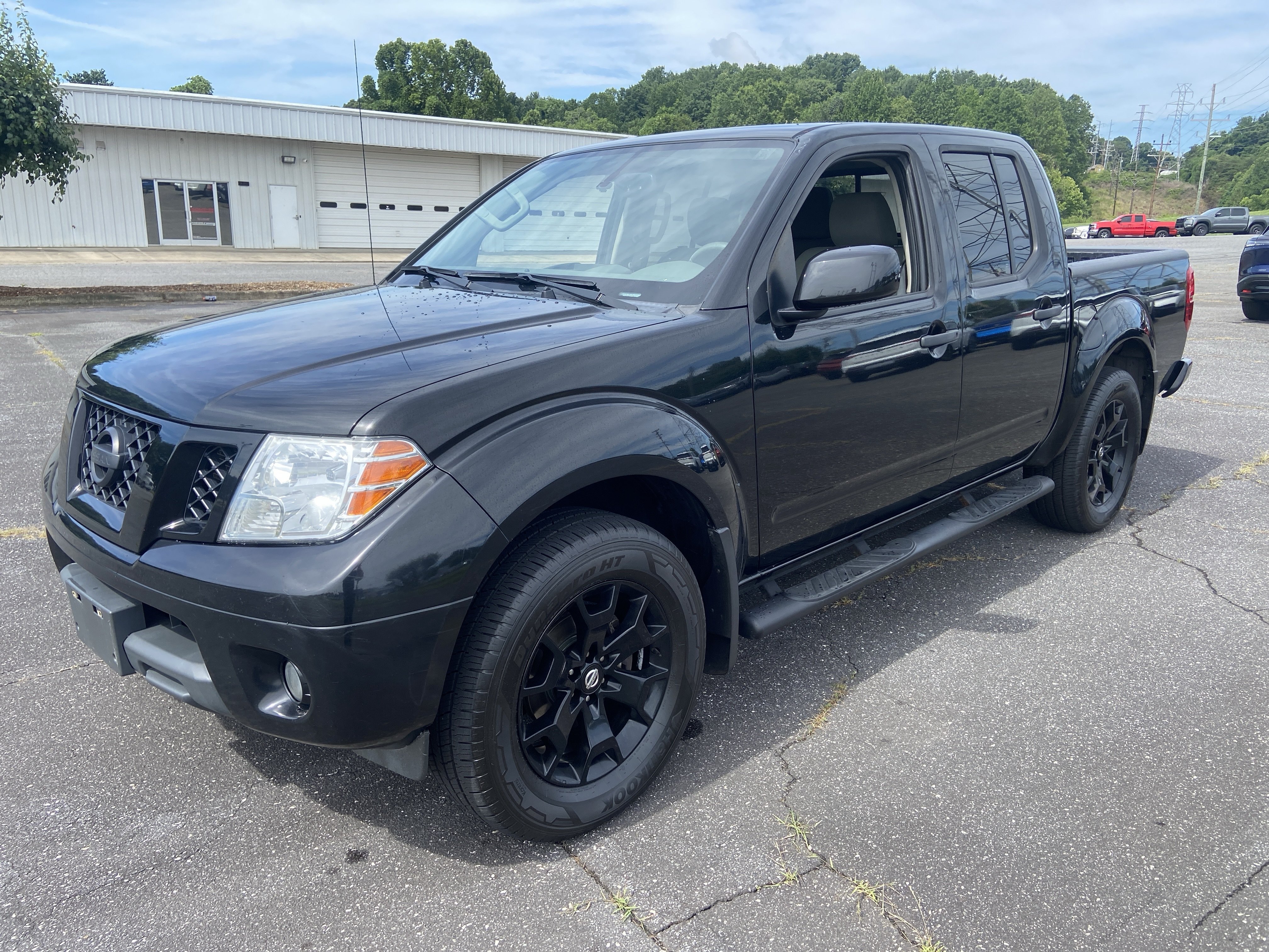 Used 2021 Magnetic Black Pearl Nissan SV image 1