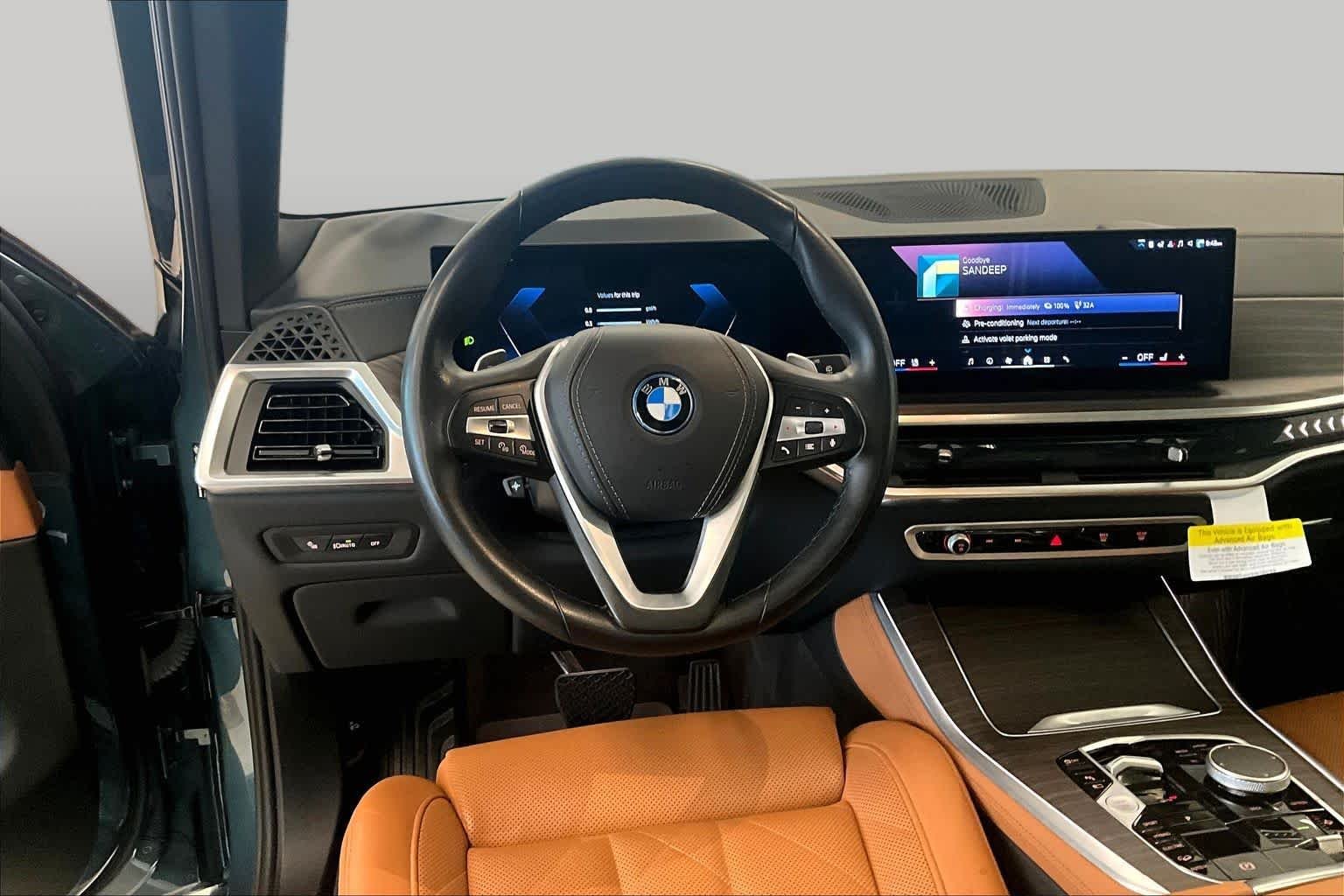 Used 2024 Blue Ridge Mountain Metallic BMW xDrive50e image 16