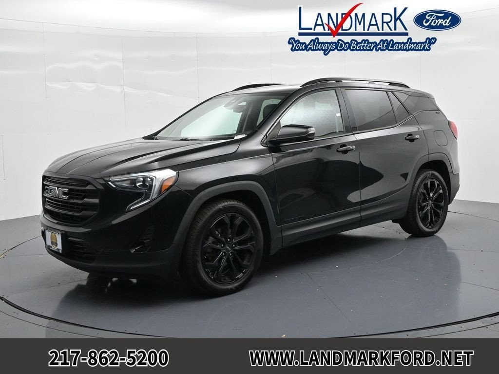 Used 2021 Ebony Twilight Metallic GMC FWD 4dr SLT image 1