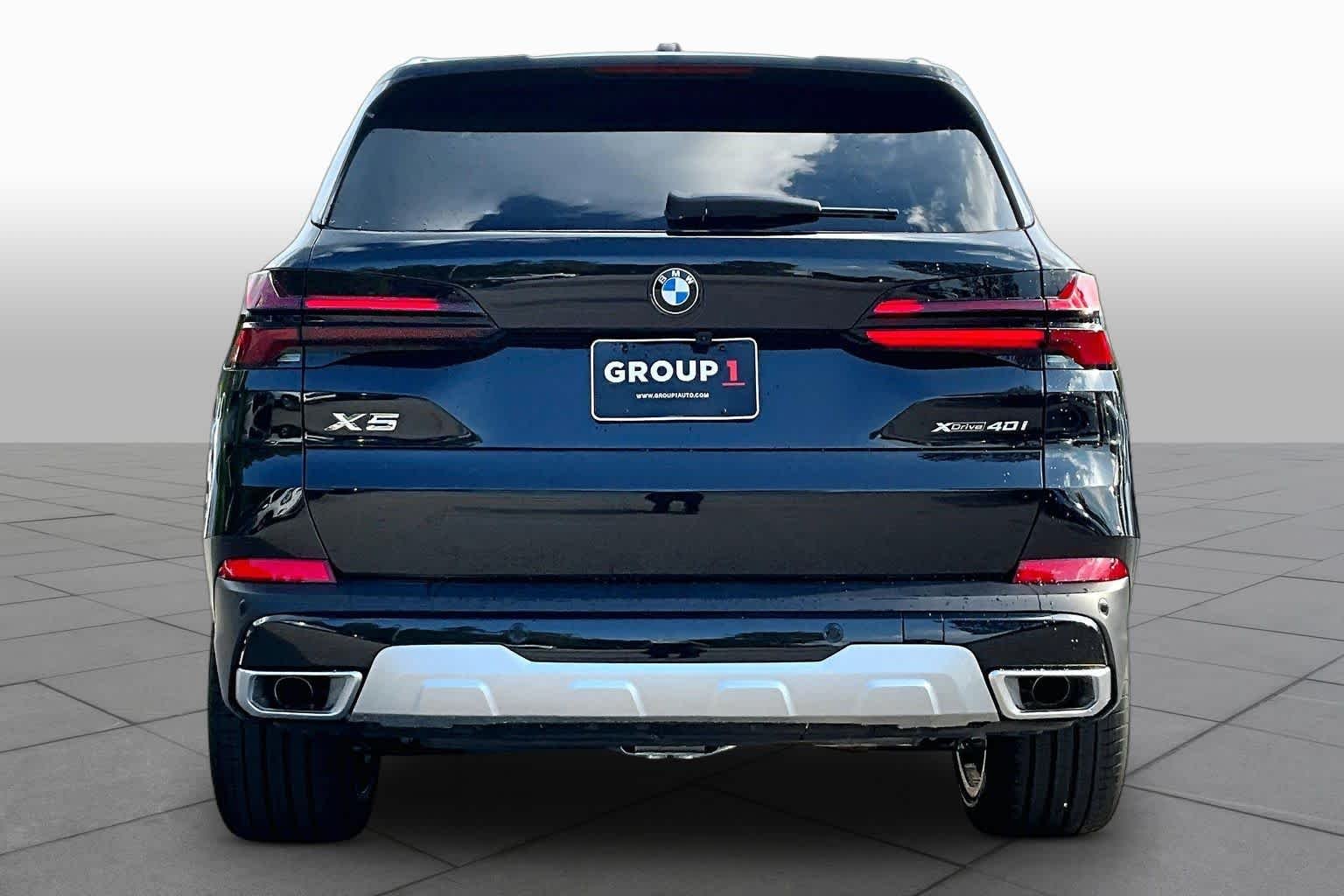 New 2026 Black Sapphire Metallic BMW xDrive40i image 4