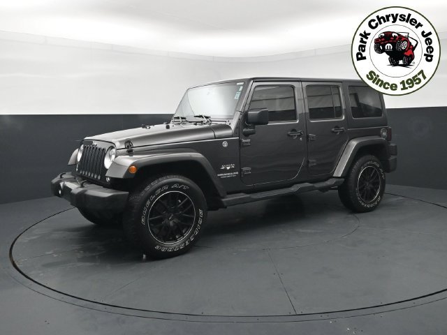 Used 2017 Jeep Wrangler Unlimited Sahara with VIN 1C4BJWEG8HL515577 for sale in Burnsville, Minnesota