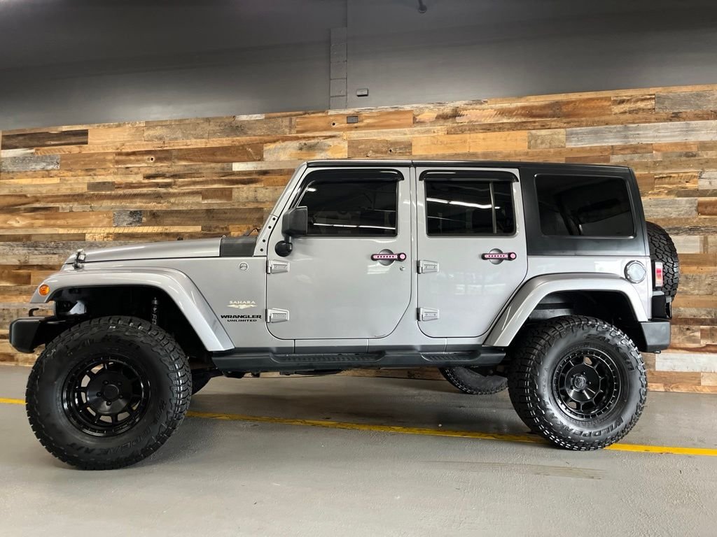 Used 2014 Billet Metallic Clearcoat Jeep Unlimited Sahara image 18