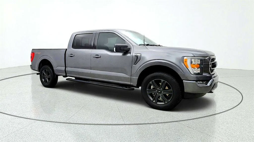 Used 2023 Carbonized Gray Metallic Ford XLT 4WD SuperCrew 6.5