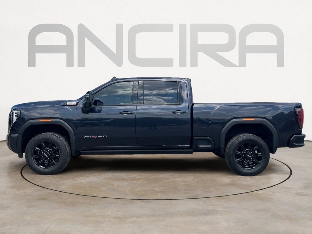 Used 2024 Titanium Rush Metallic GMC AT4 image 8