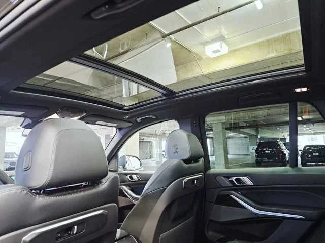 Used 2025 Black Sapphire Metallic BMW xDrive50e image 26
