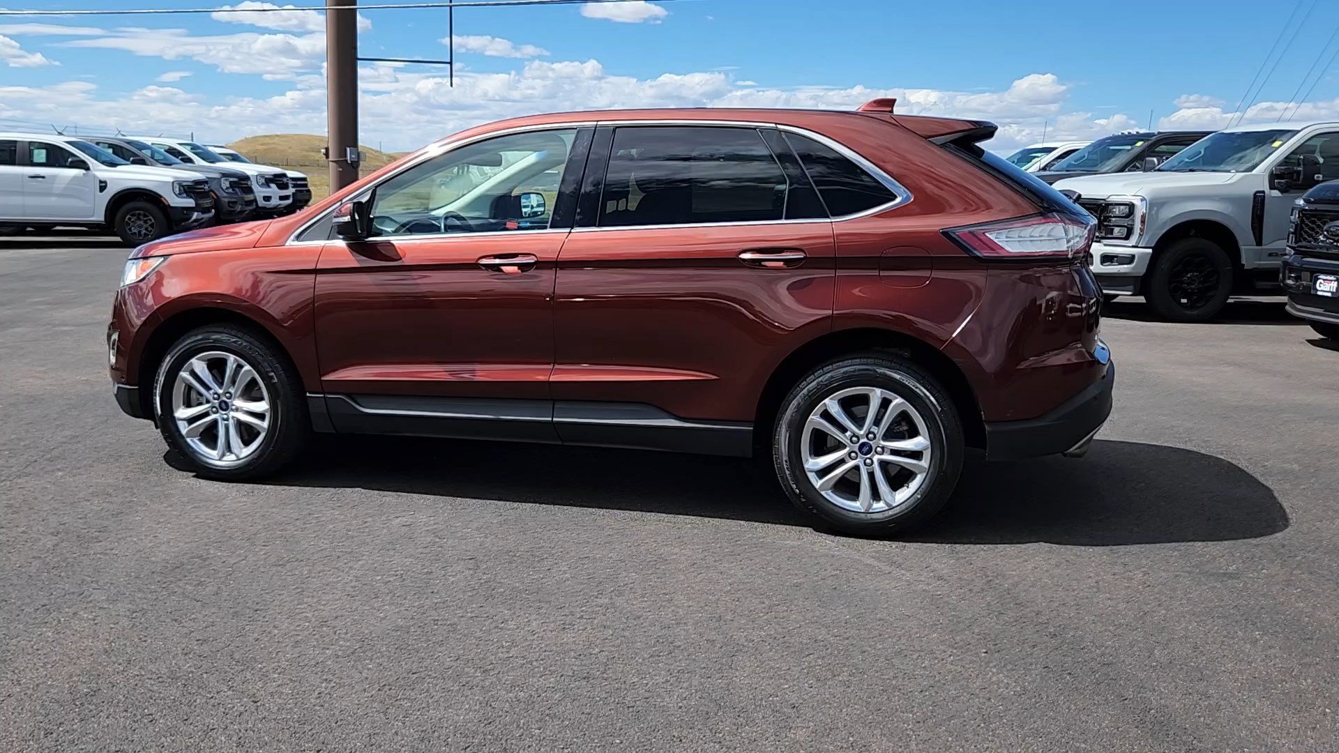 Used 2016 Bronze Fire Metallic Tinted Clearcoat Ford Titanium image 2