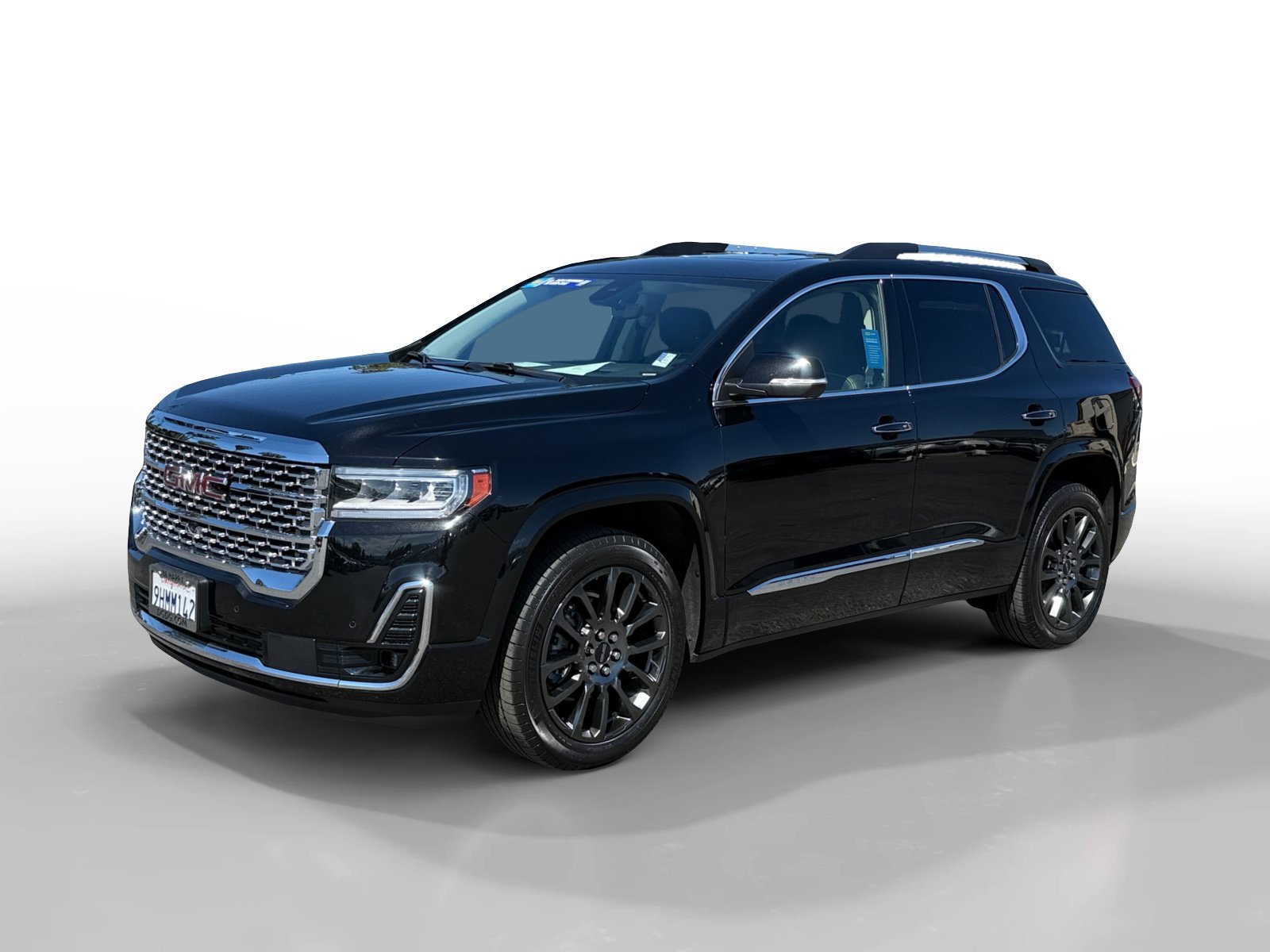 Used 2023 EBONY TWILIGHT METALLIC GMC Denali image 1