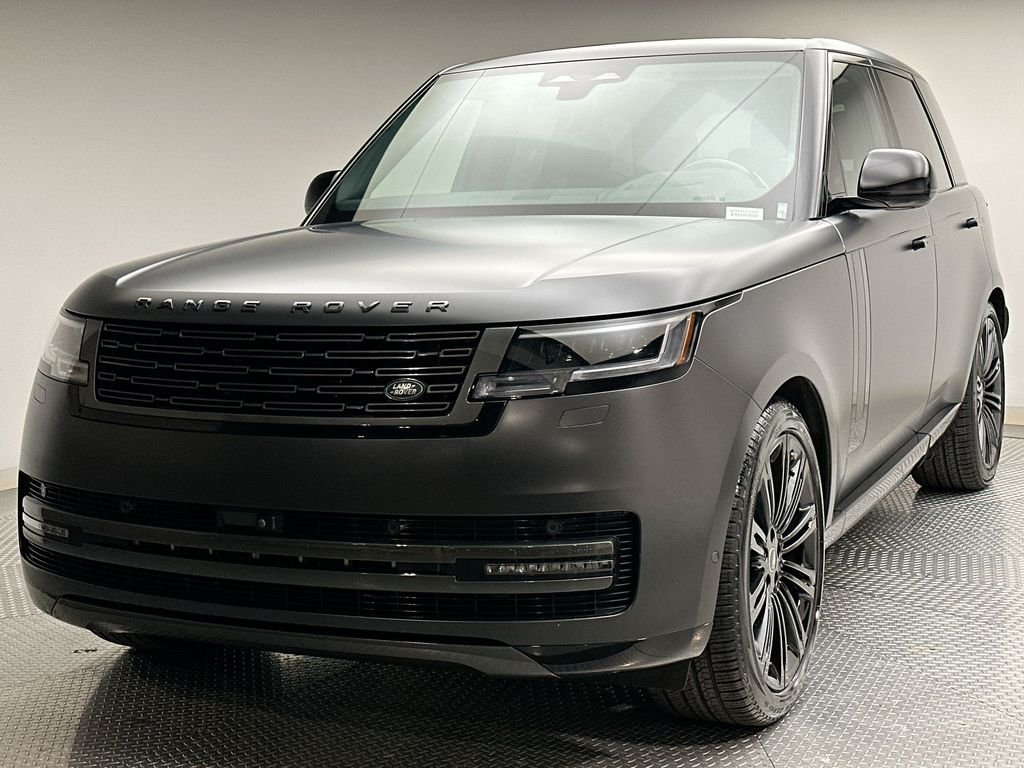 Used 2024 Santorini Black Metallic Land Rover SE image 1
