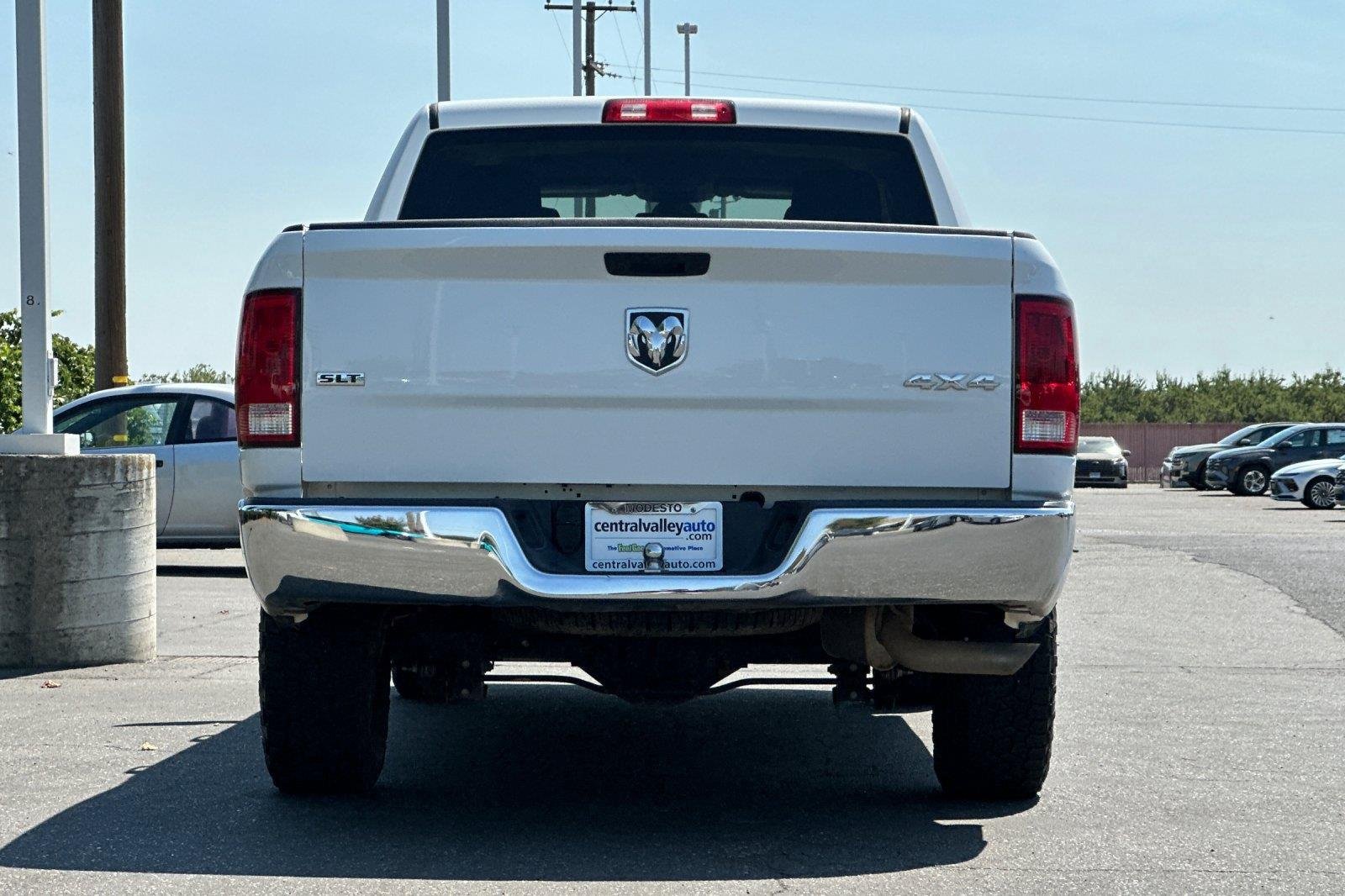 Used 2023 Bright White Clearcoat Ram SLT image 5