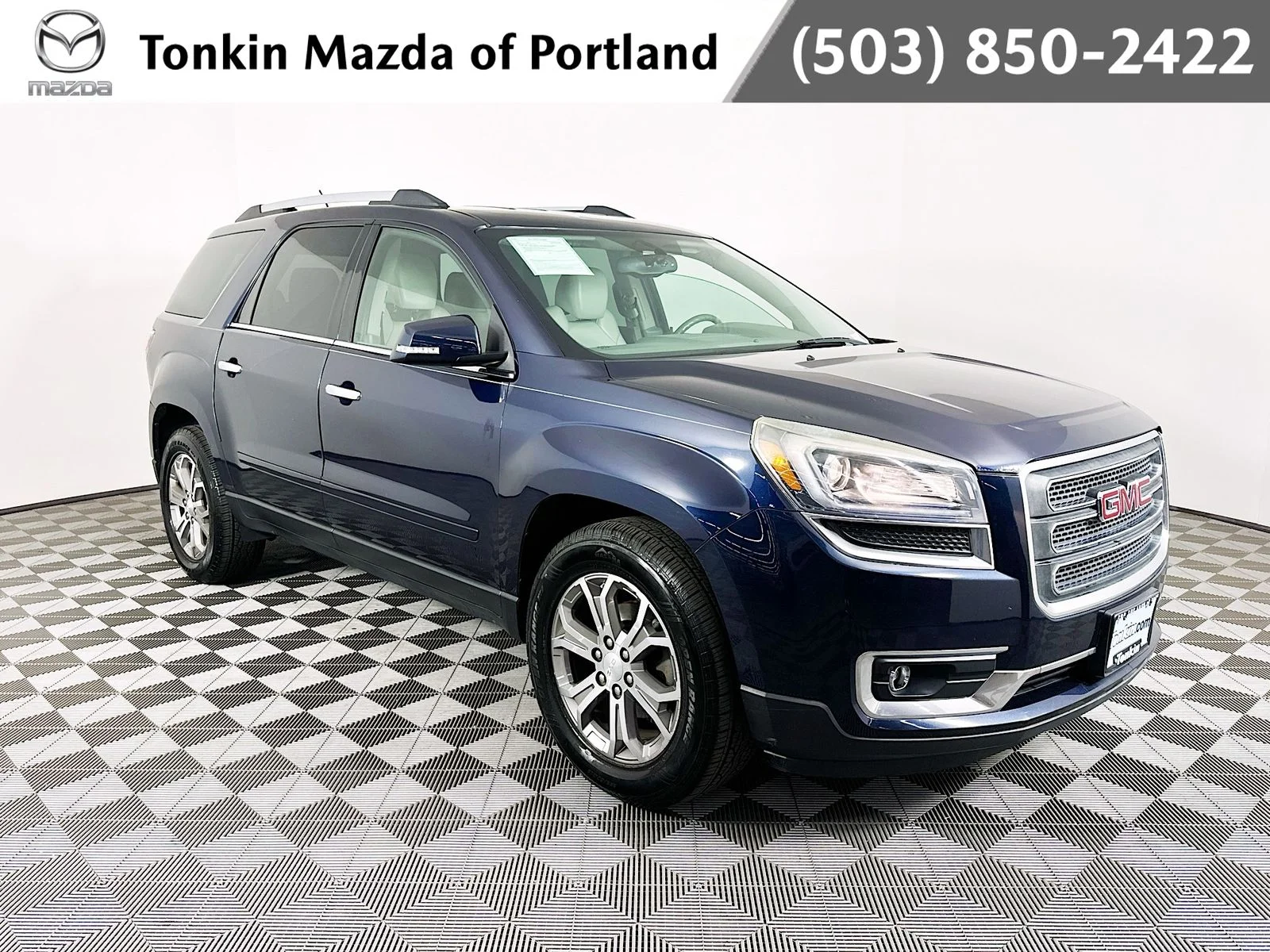 Used 2015 Dark Sapphire Blue Metallic GMC SLT-1 image 1