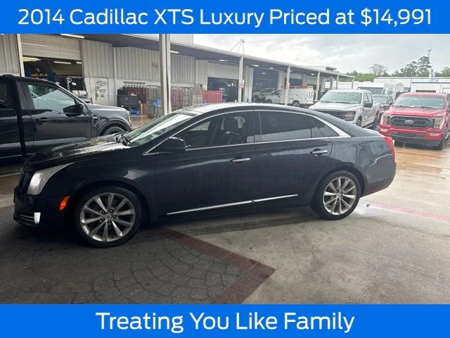 Used 2014 Sapphire Blue Metallic Cadillac Luxury image 1