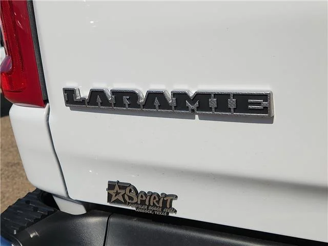 Used 2025 White RAM Laramie 4x4 Crew Cab 144.5 in. WB image 8