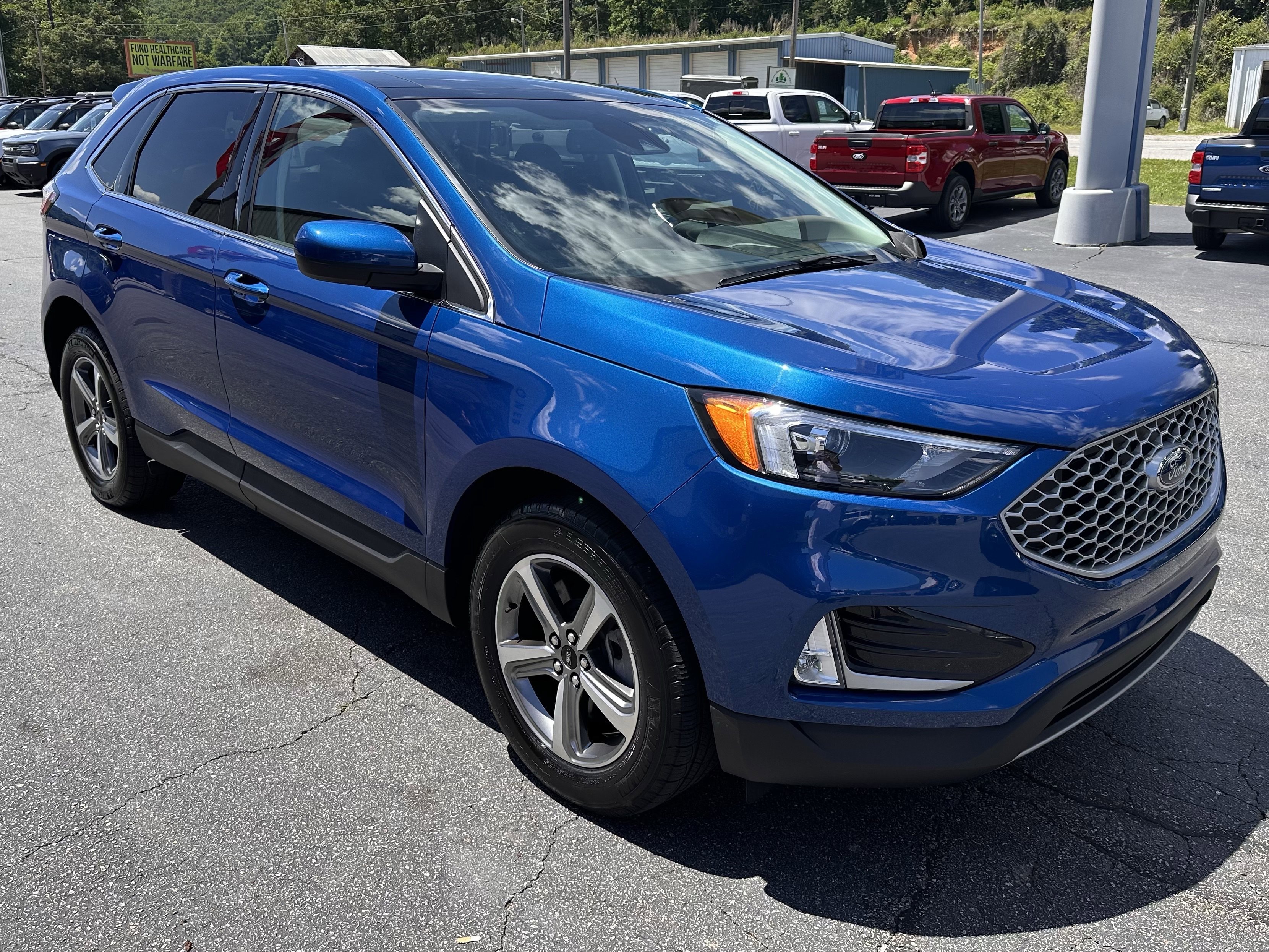 Certified Used 2024 Atlas Blue Metallic Ford SEL image 4