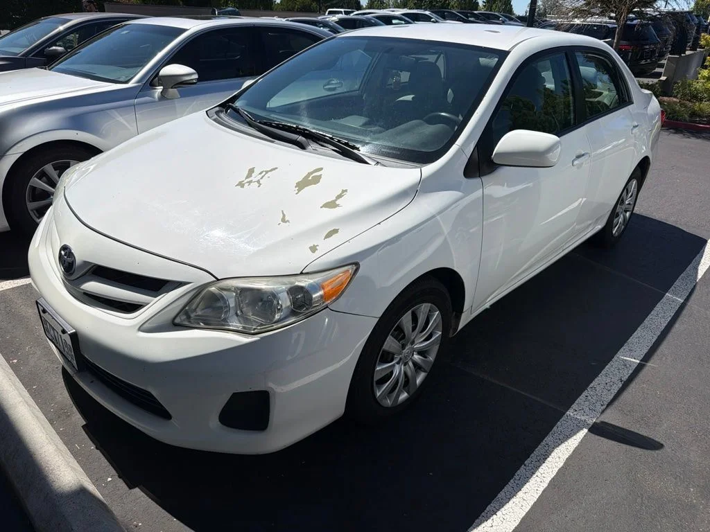 Used 2012 White Toyota LE image 1
