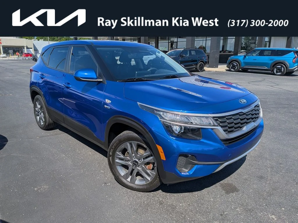 Used 2021 Blue Kia LX image 1