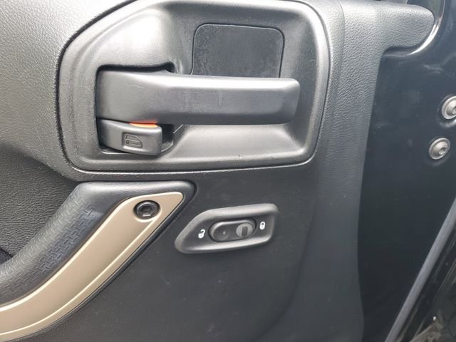 Used 2017 Black Jeep Unlimited Sahara image 9