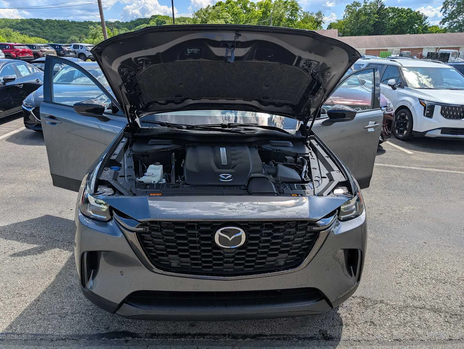 New 2026 Machine Gray Metallic Mazda Premium Sport image 10
