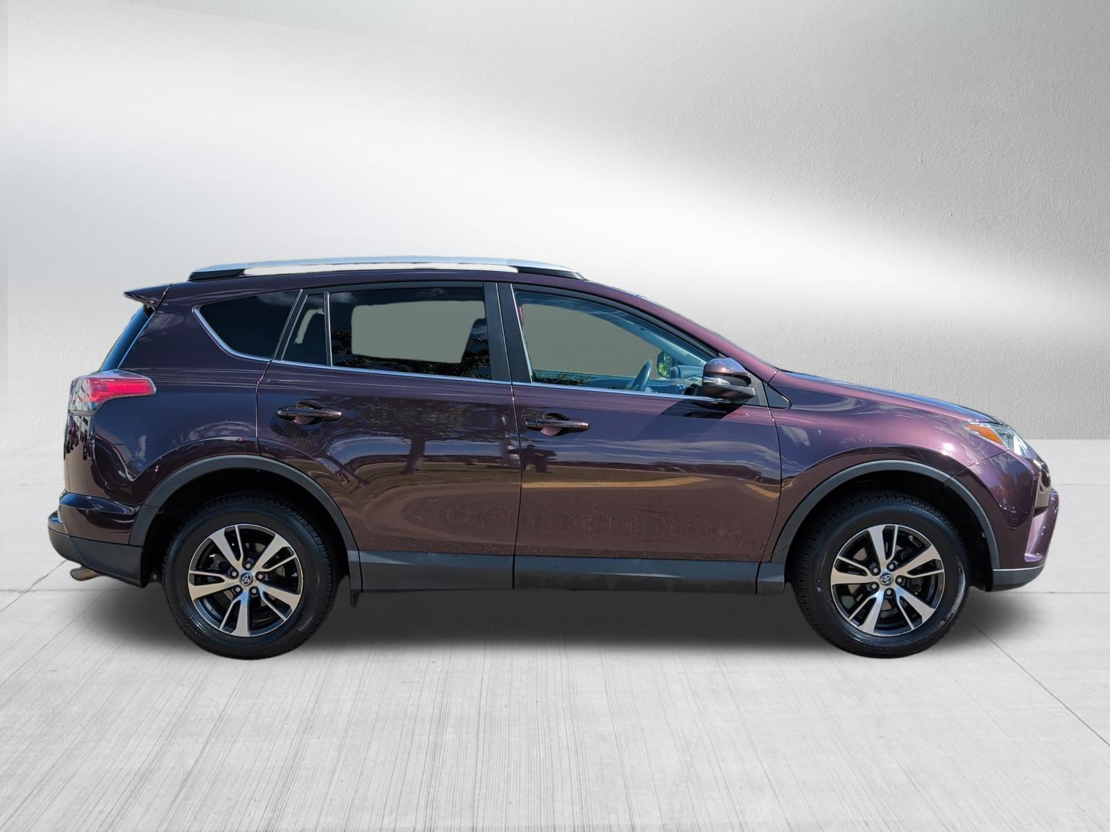 Used 2016 Black Currant Metallic Toyota XLE image 8