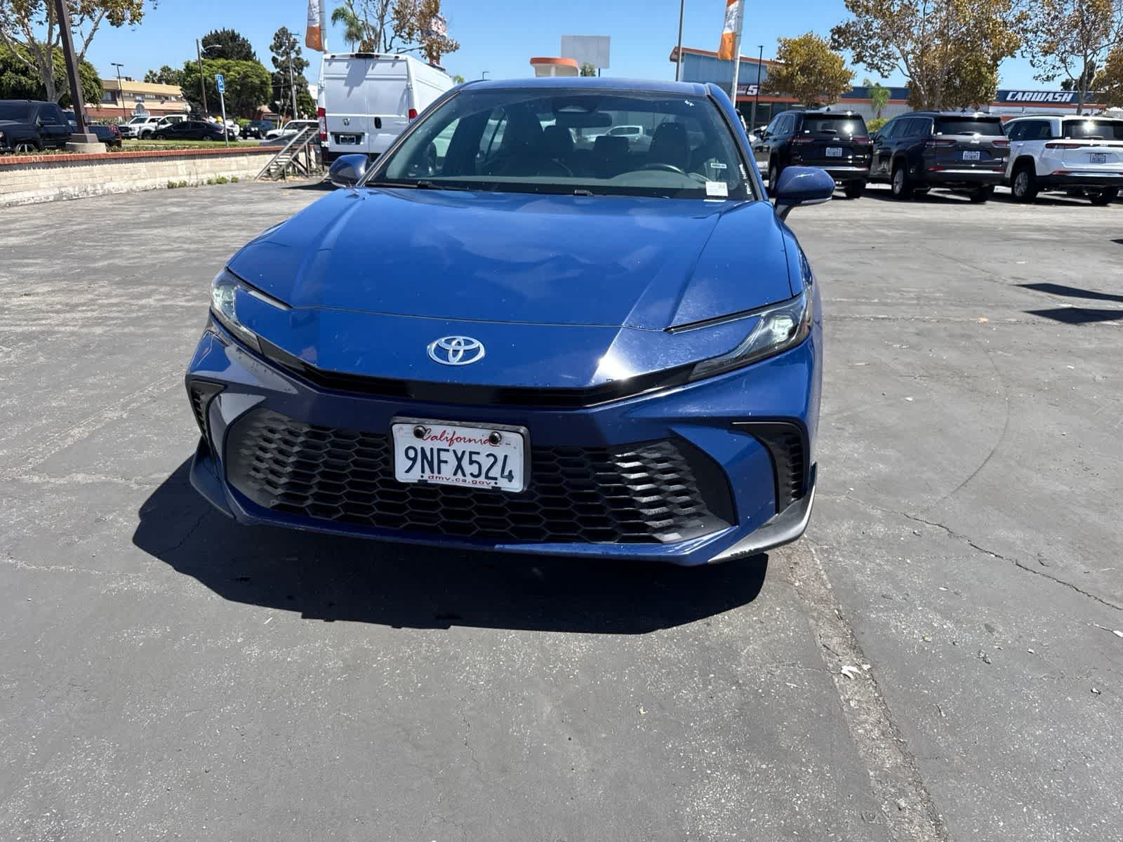 Used 2025 Reservoir Blue Toyota SE image 3