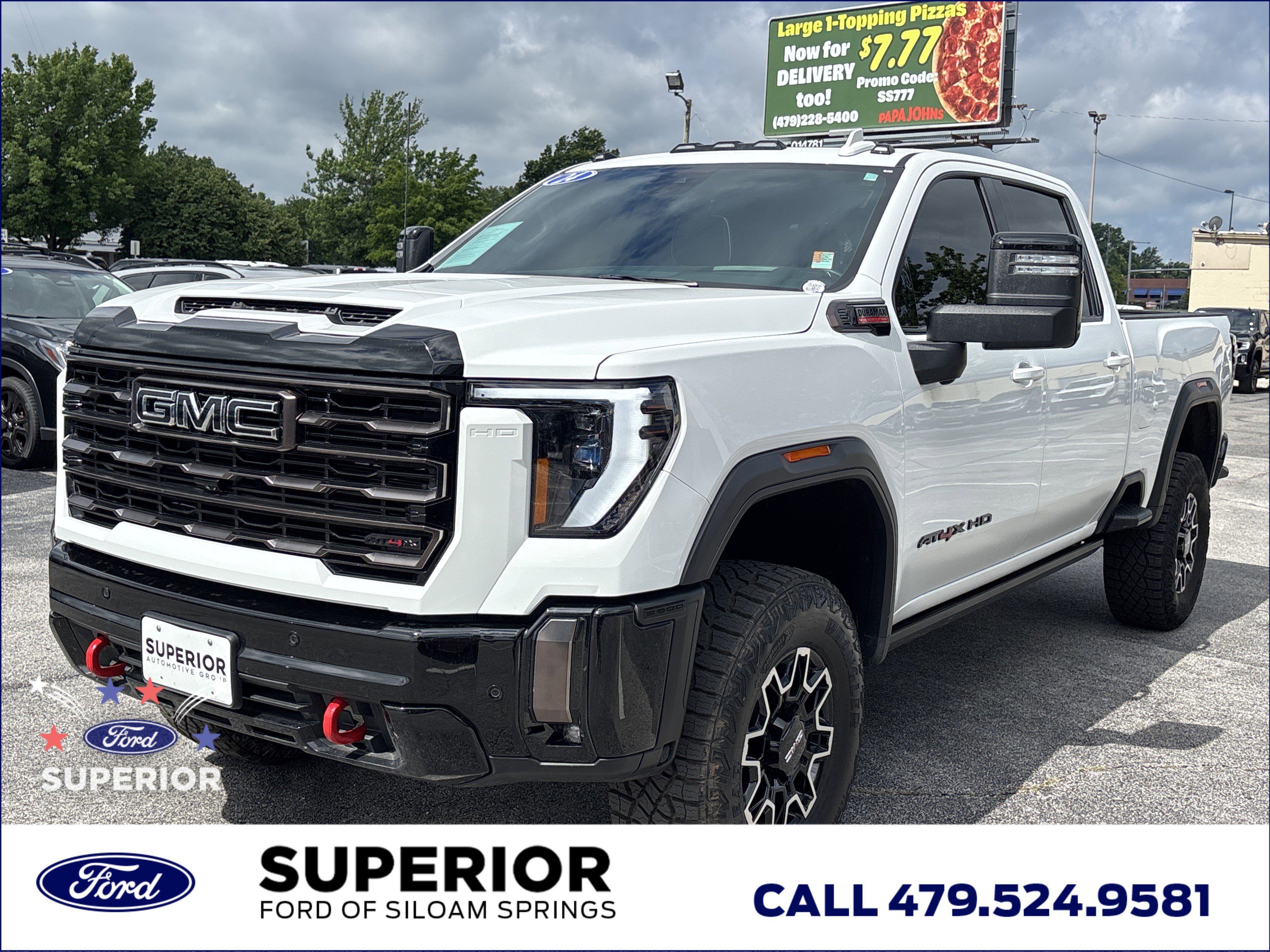 Used 2024 Summit White GMC AT4X Crew Cab 4WD image 12