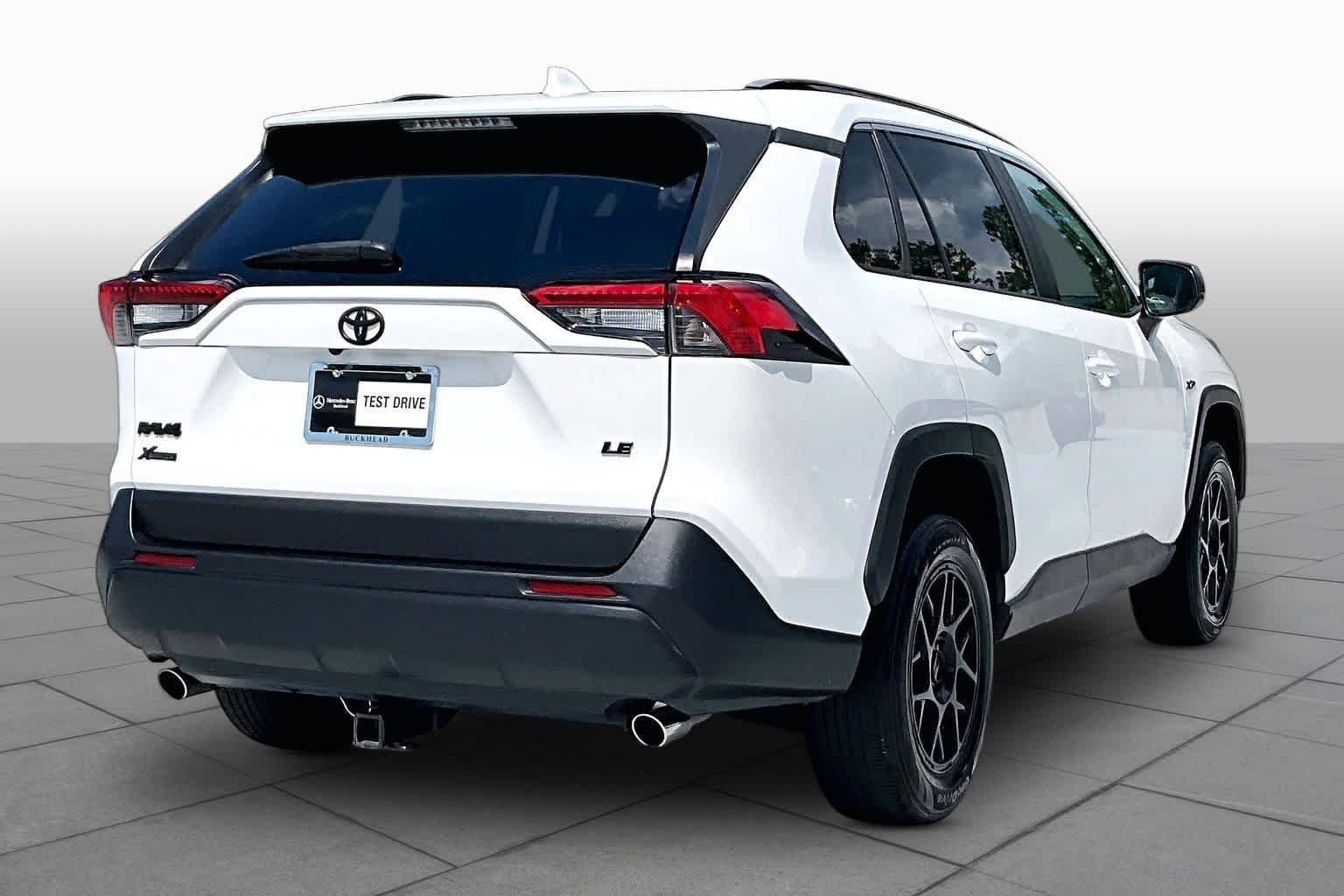 Used 2021 Super White Toyota LE image 13