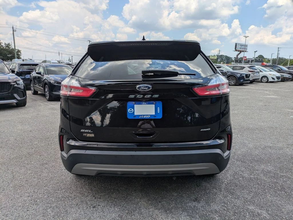 Certified Used 2024 Agate Black Metallic Ford SEL image 5