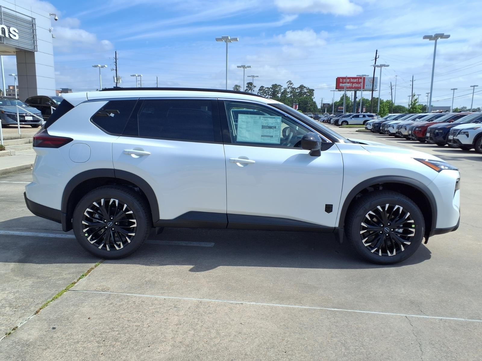 2026 Nissan Rogue Dark Armor™ White at Robbins Nissan