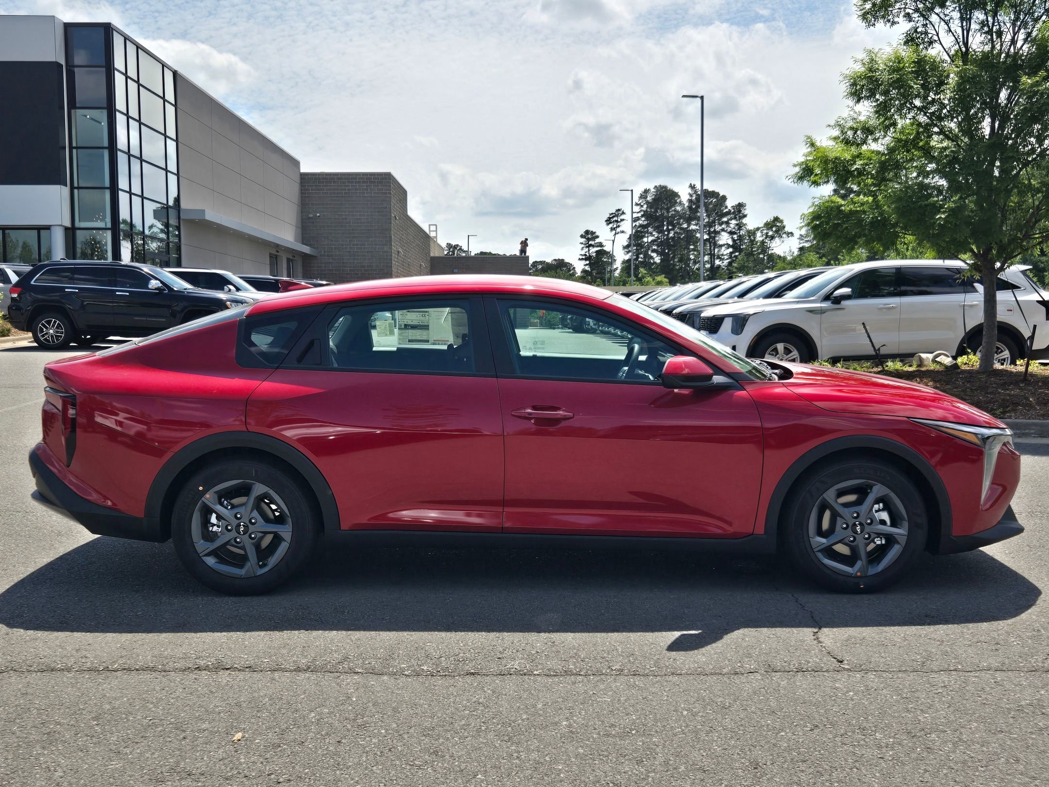 New 2026 Currant Red Kia LXS image 8