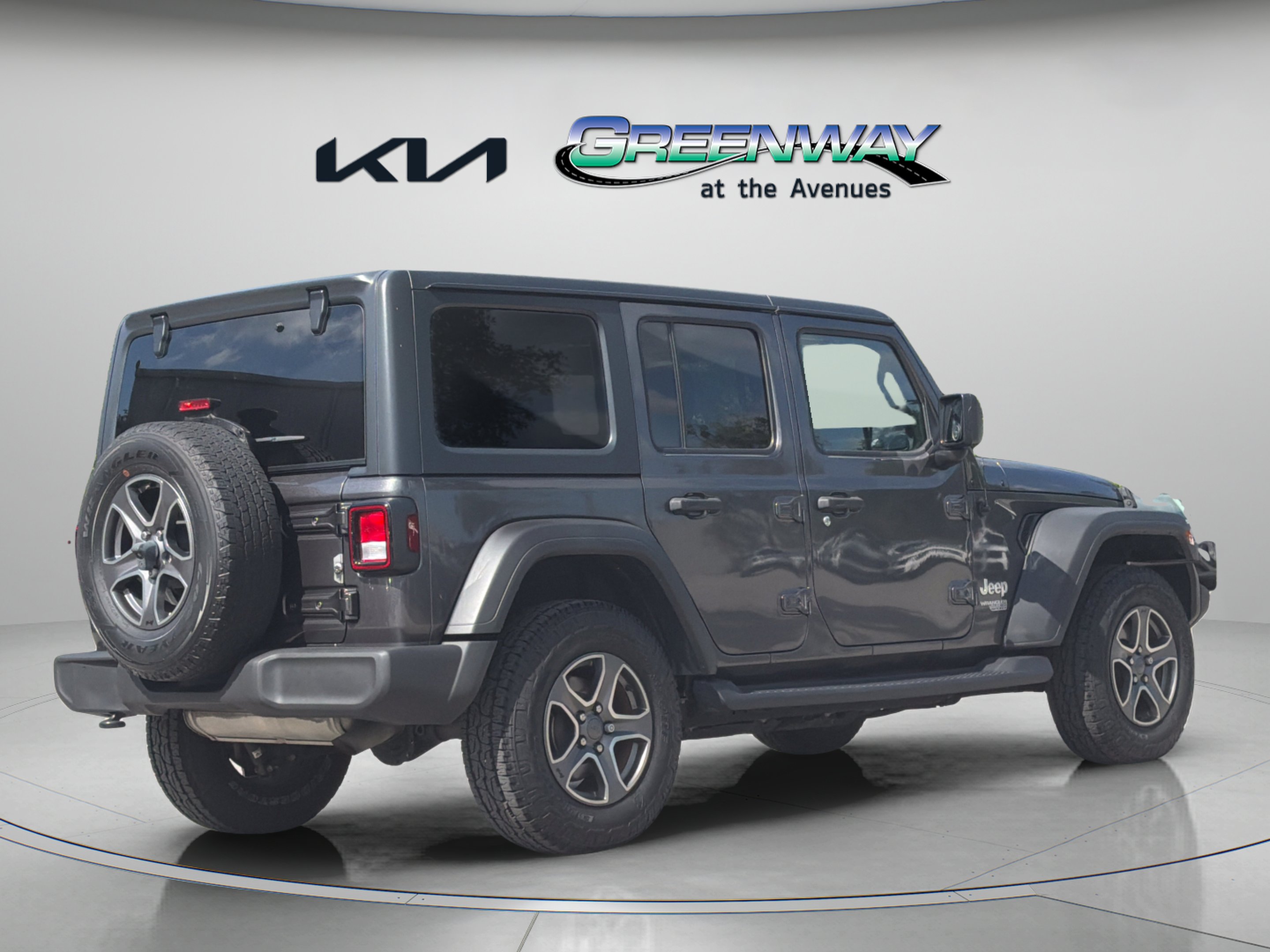Used 2018 Granite Crystal Metallic Clearcoat Jeep Sport S image 6