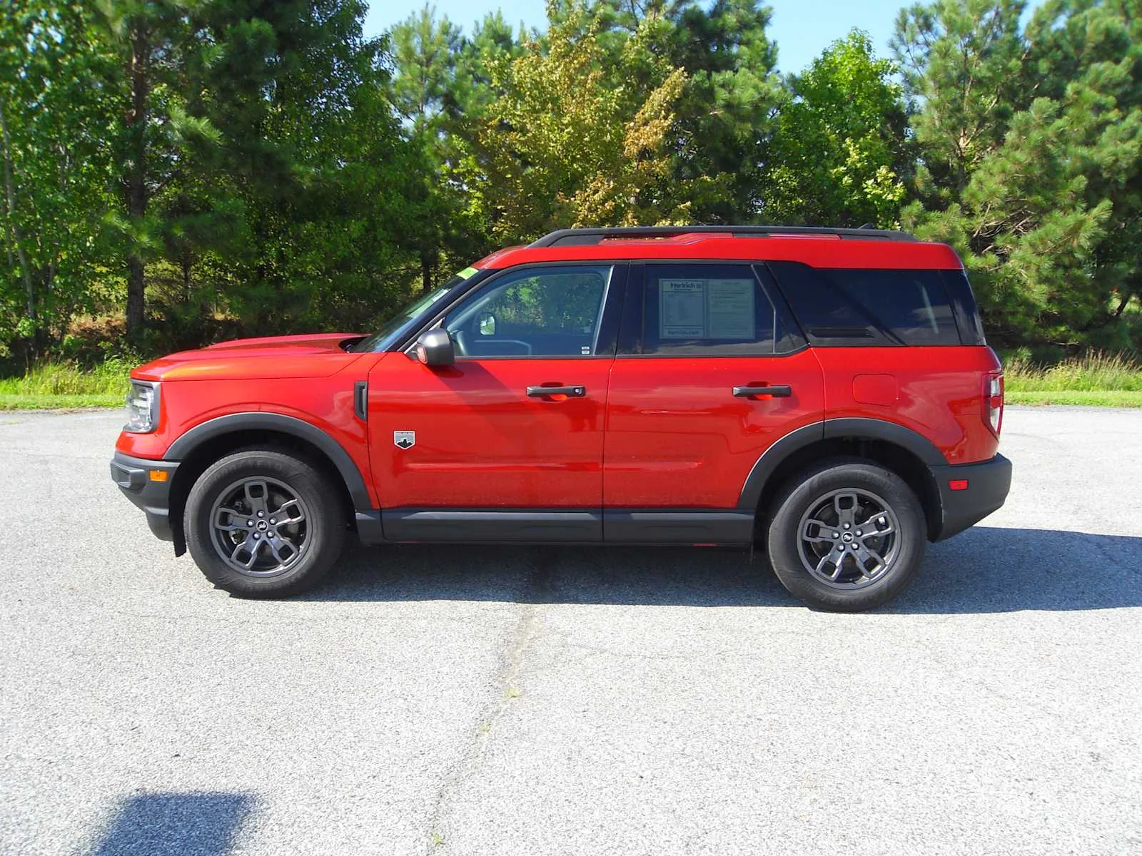 Used 2023 Hot Pepper Red Tinted Clearcoat Ford Big Bend image 2