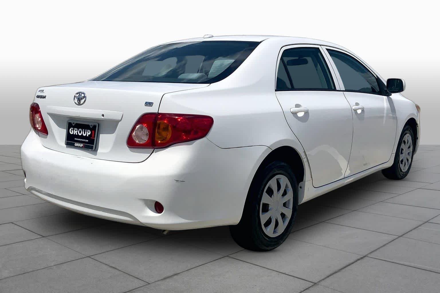 Used 2010 Super White Toyota LE image 12