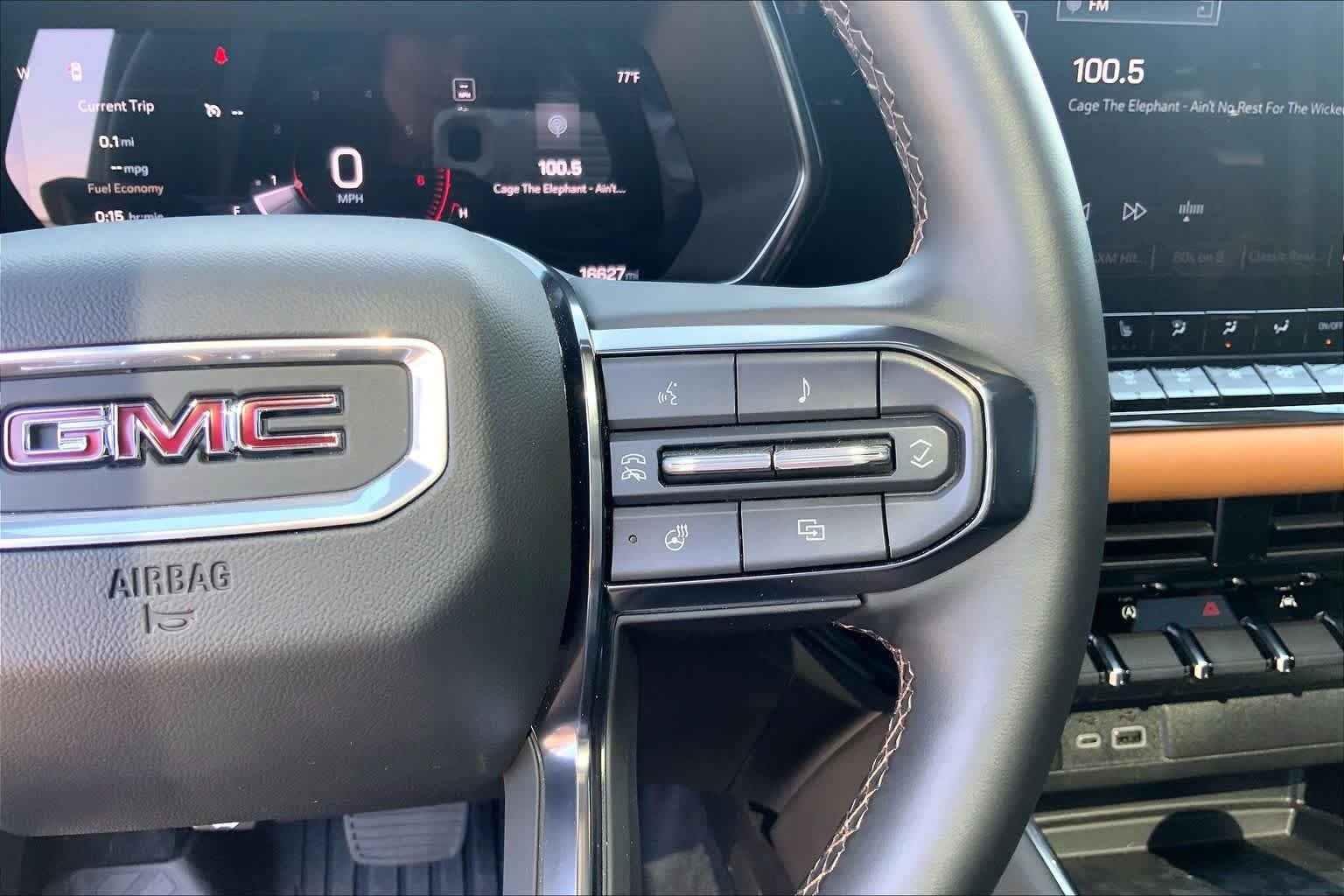 Used 2025 Sterling Metallic GMC 4WD AT4 image 23