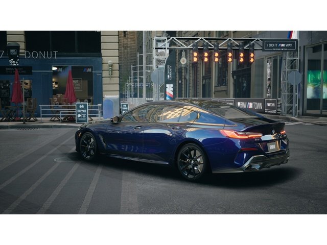 New 2026 Tanzanite Blue II Metallic BMW 840i image 2
