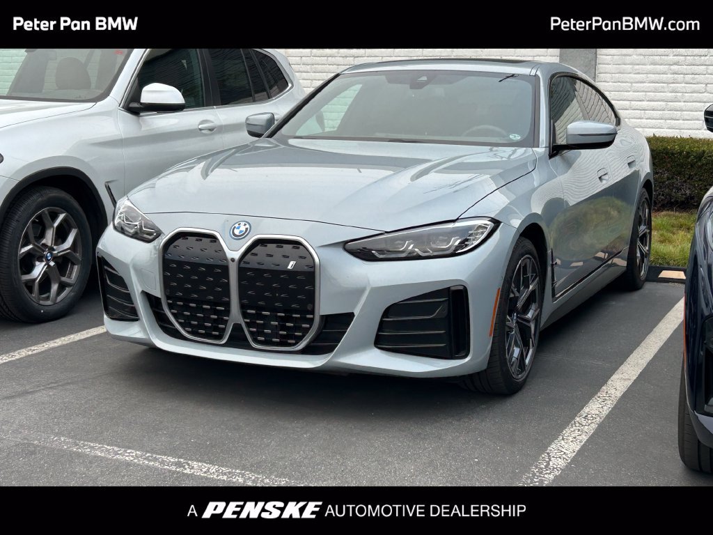Certified Used 2024 Gray Metallic BMW eDrive40 image 1