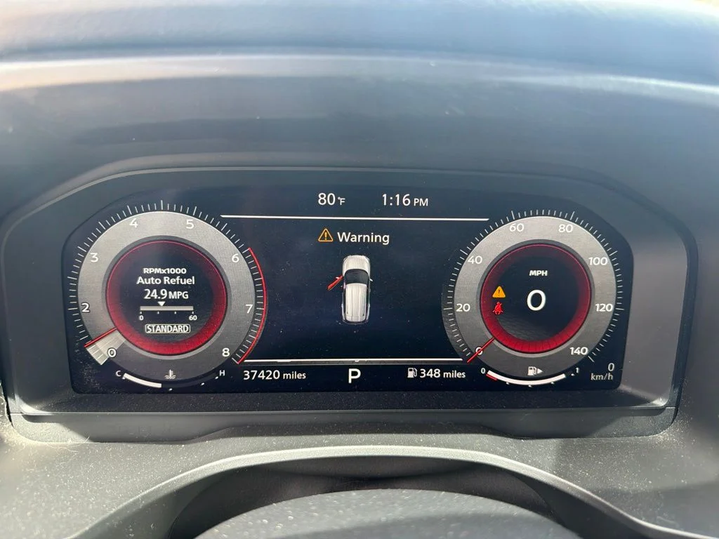 Used 2021 Pearl White Tricoat/Super Black Nissan Platinum image 2