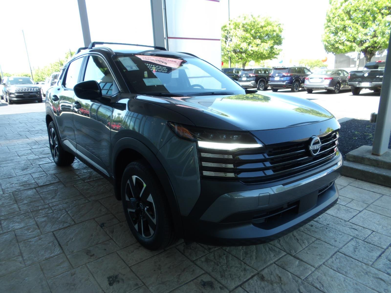 New 2026 Gun Metallic Nissan SV image 3