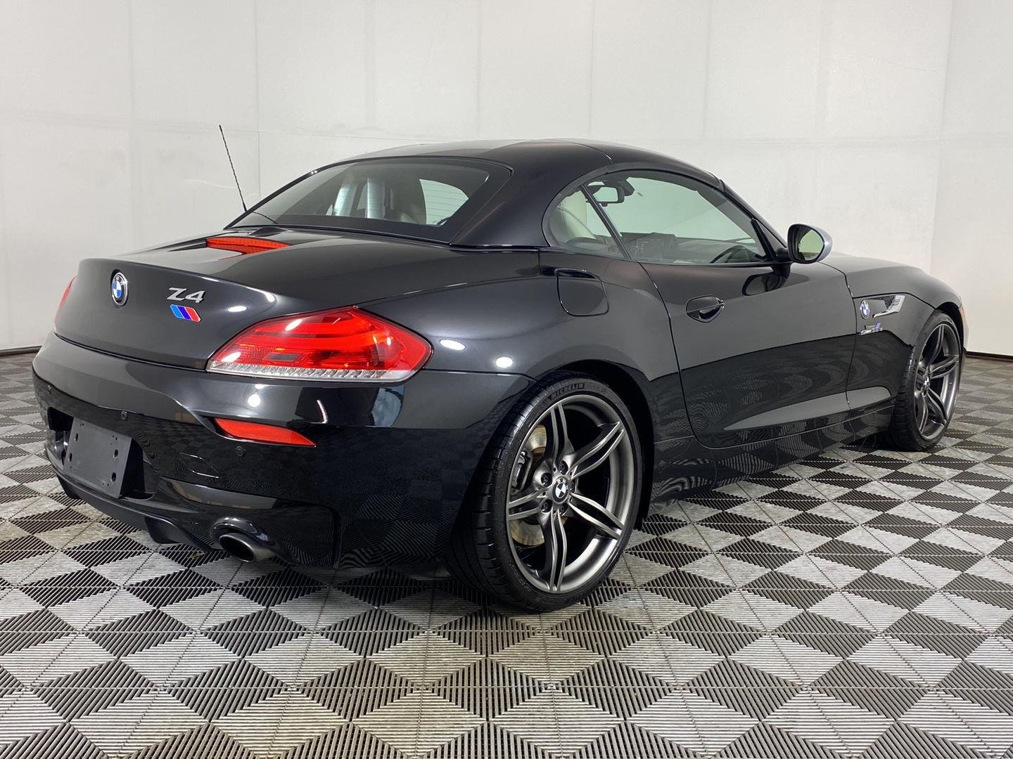 Used 2011 Black Sapphire Metallic BMW sDrive35is image 5