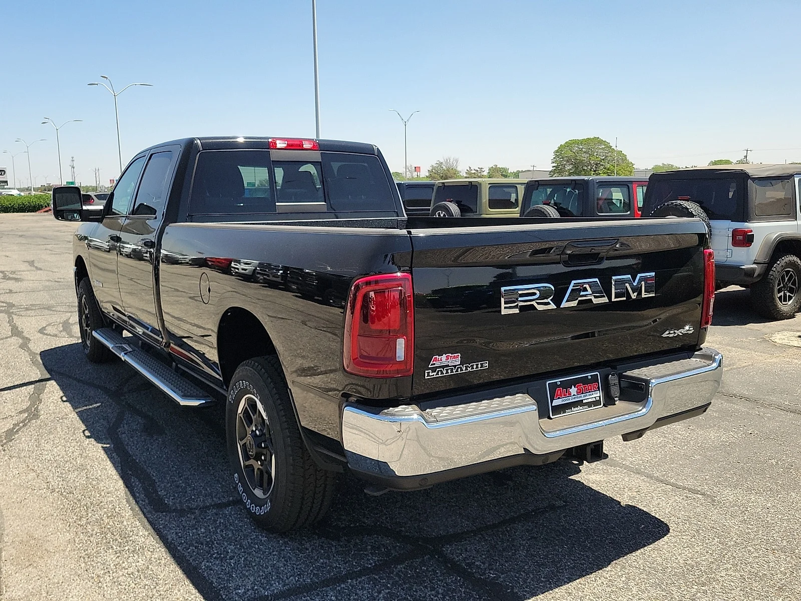 New 2026 Diamond Black Crystal Pearlcoat Ram LARAMIE CREW CAB 4X4 8