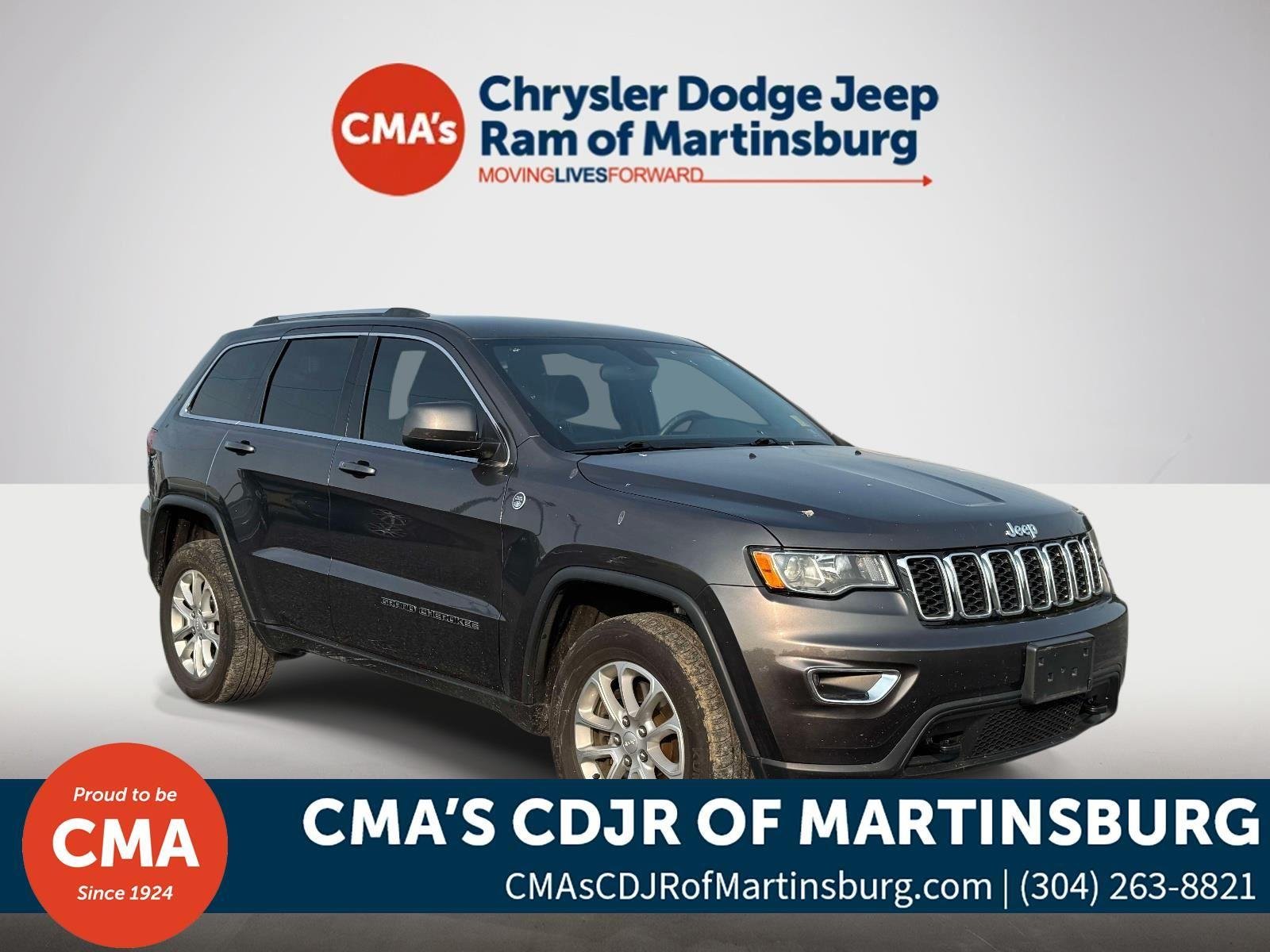Used 2021 Granite Crystal Metallic Clearcoat Jeep Laredo E image 1
