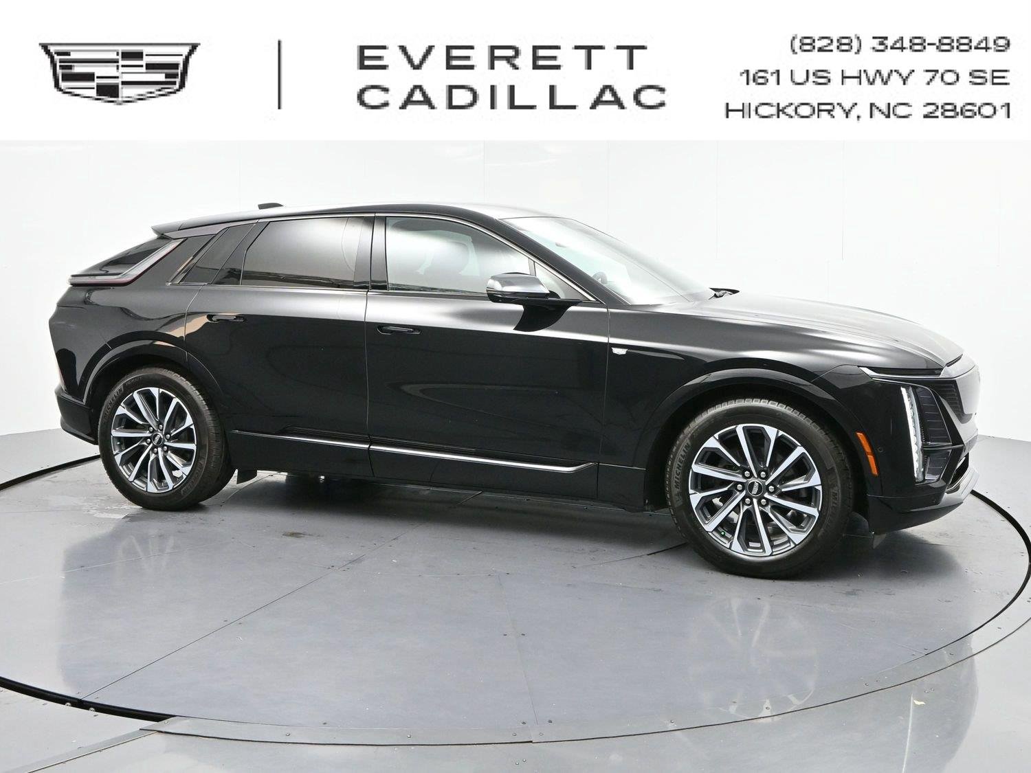 Used 2024 Stellar Black Metallic Cadillac Sport 1 image 1
