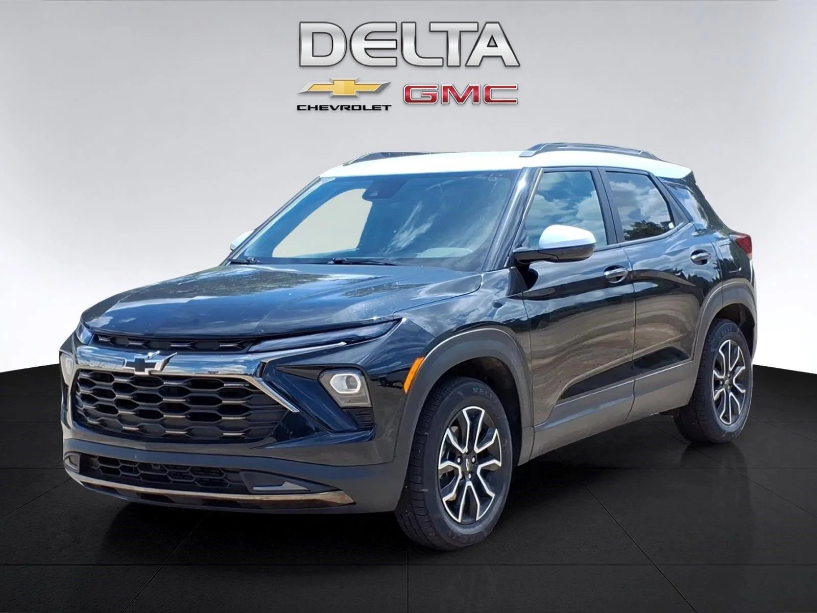 Used 2024 Mosaic Black Metallic Chevrolet ACTIV image 1